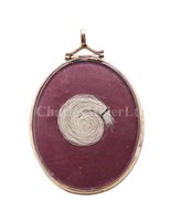 Lot 75 - A VERRE ÉGLOMISÉ LOCKET OF EMMA HAMILTON WITH...
