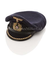 Lot 95 - A WORLD WAR II GERMAN NAVY LIEUTENANT'S PEAKED...