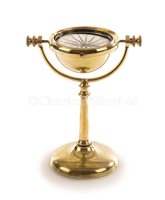 Lot 197 - A 19TH-CENTURY LACQUERED BRASS GIMBALLED DRY...
