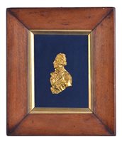 Lot 84 - A 19TH-CENTURY GILT BRASS PROFILE OF...