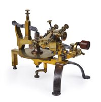 Lot 234 - A 19TH-CENTURY GEAR WHEEL CUTTING...