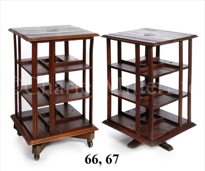 Lot 67 - A REVOLVING LIBRARY BOOKCASE MADE FROM TIMBER...