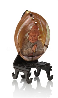 Lot 149 - A 19TH-CENTURY FRENCH SHELL-MOUNTED TERRACOTTA...