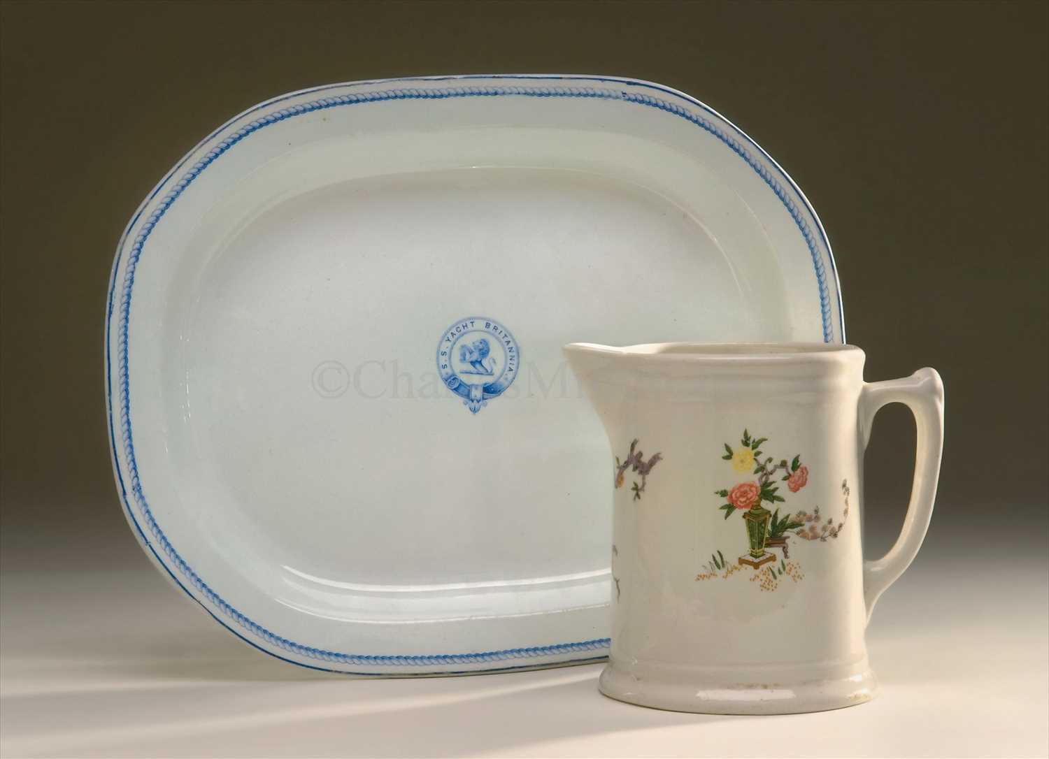 Lot 114 - A BLUE AND WHITE CARVER FROM THE S.S. YACHT...