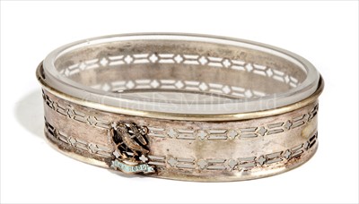 Lot 83 - H.M.S. HOOD: AN EPNS GLASS-LINED OVAL...
