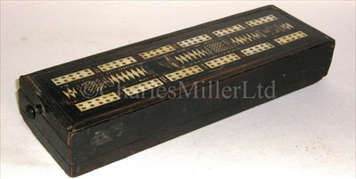 Lot 121 - A 19TH-CENTURY IVORY-INLAID GAMES BOX<br/>the lid...