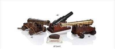 Lot 44 - A MODEL CANNON<br/>cast in brass with 11½in....