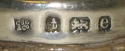 Lot 50 - A PAIR OF SILVER DWARF CANDLESTICKS <br/>modelled...