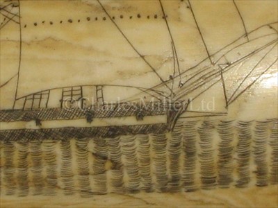 Lot 100 - A SCRIMSHAW-DECORATED WHALE'S TOOTH<br/>incised...