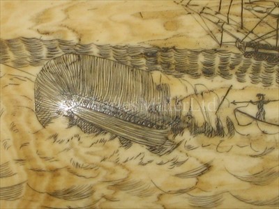 Lot 100 - A SCRIMSHAW-DECORATED WHALE'S TOOTH<br/>incised...