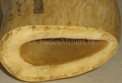 Lot 100 - A SCRIMSHAW-DECORATED WHALE'S TOOTH<br/>incised...