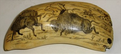 Lot 105 - AN UNUSUAL 19TH-CENTURY SCRIMSHAW-DECORATED...