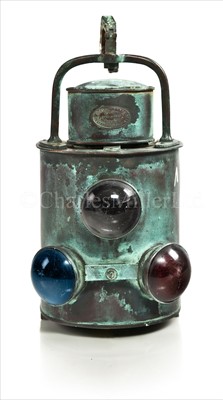 Lot 126 - A RARE TRIPLE-BULL'S-EYE LENS COPPER AND BRASS...