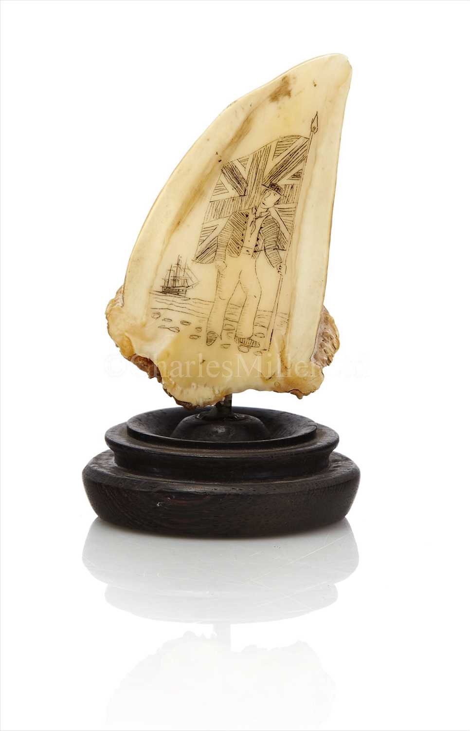 Lot 145 - A 19TH-CENTURY SCRIMSHAW-DECORATED HALF...