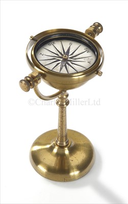 Lot 194 - A 19TH-CENTURY LACQUERED BRASS GIMBALLED DRY...